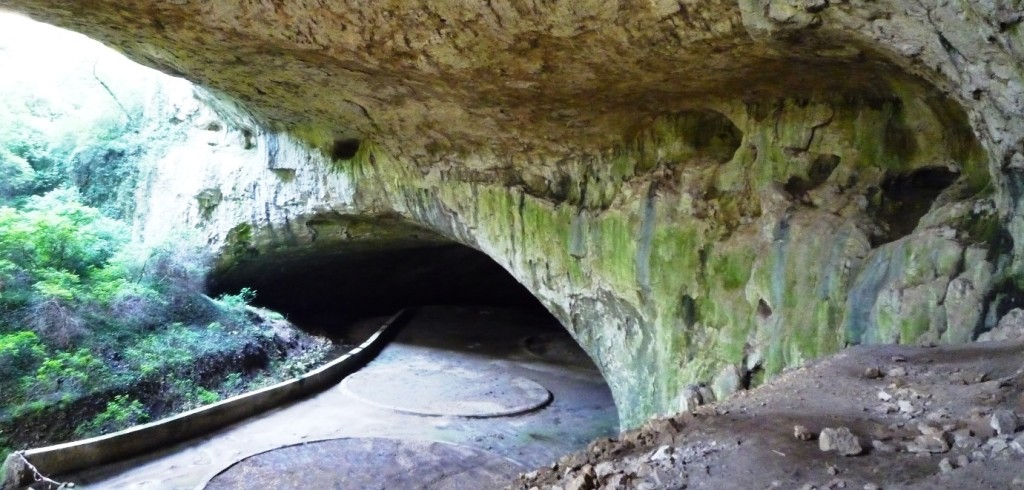 Devetàshka Cave is a huge karst cave in Bulgaria. The cave is famous for its long-term occupancy for human and other types of biological populations
