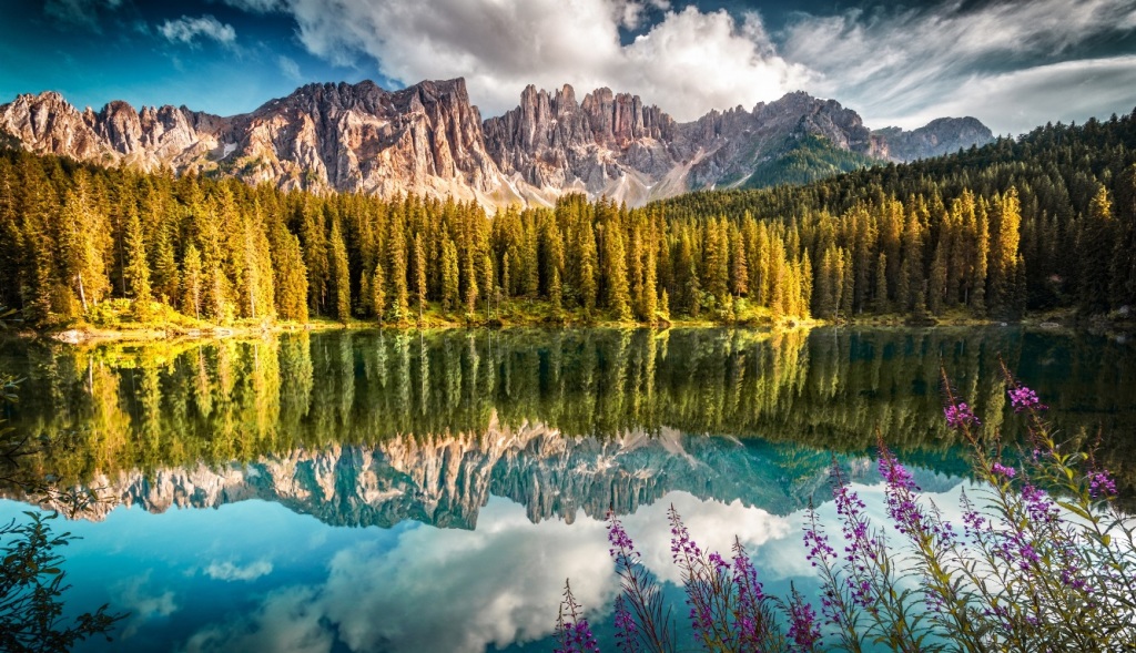 The Carezza Lake is located in South Tyrol Italy and is considered one of the most beautiful of the many Alpine lakes.