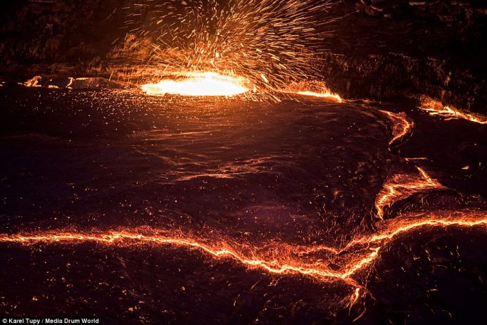 The ferocity of the volcano is clear as lava splashes up from a pool that is said to have formed around 1906