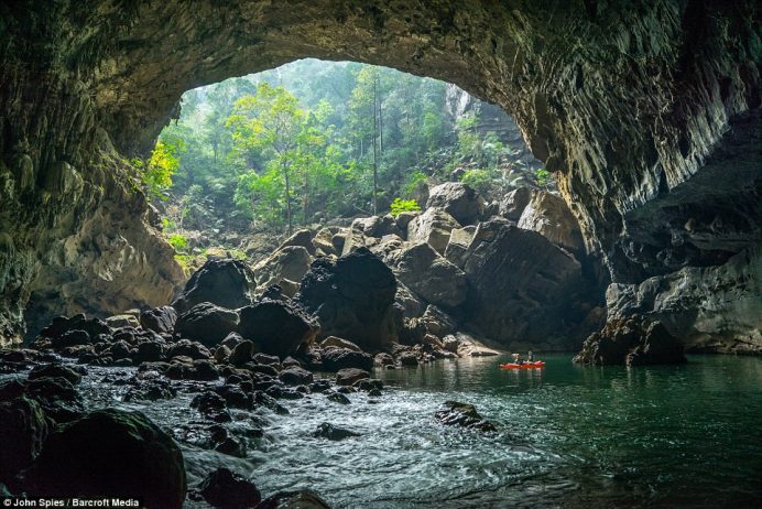 The upstream inflow entrance of Tham Khoun Xe has a verdant forest inside a huge collapsed doline. It is possible to kayak from the resurgence to here and back in one full day