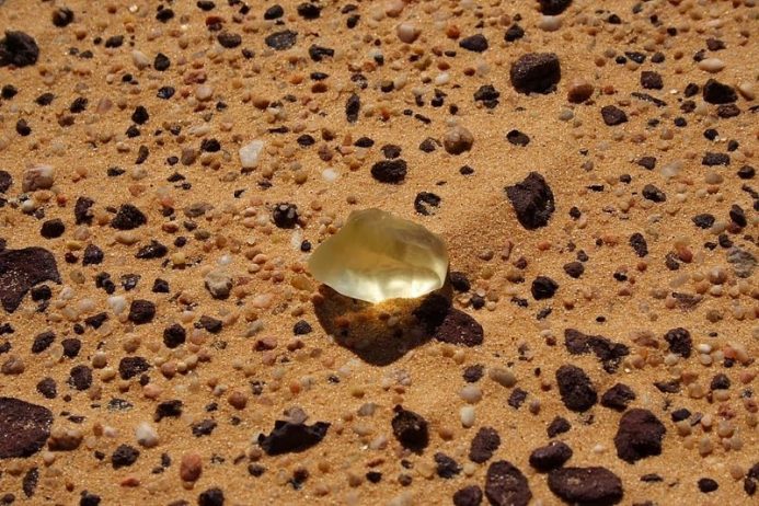 The Mysterious Libyan Desert Glass lies between the borders of Egypt & Libya. It is called Great Sand Sea, massive sandy desert natural glass is found.