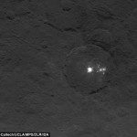 This image reveals the bright spots in greater detail. Several spots can be seen next to the largest bright area on the left, estimated to be six miles (9km) wide