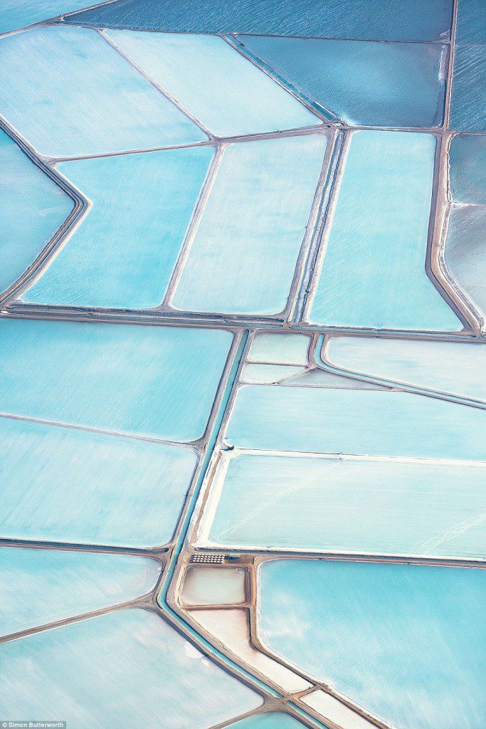 Shimmering Australian Salt Ponds are pictured in stunning aerial photographs, hard to believe that these spectacular portraits are not watercolor paintings depicting otherworldly patterns.