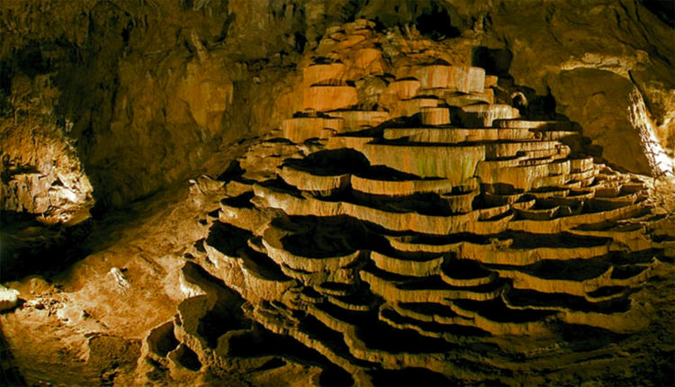 Terraces of precipitated calcium carbonate inside Skocjan Caves.