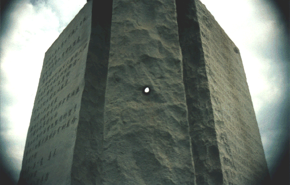 The hole that you see in the stone was drilled in the Center Stone so that the North Star could be visualized through it at any moment