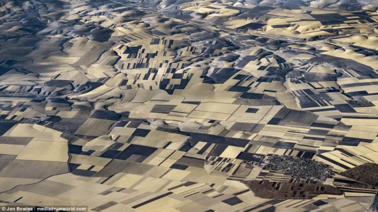 Aerial Photographs - These rolling fields and small towns in Bulgaria look they're part of a puzzle in this snap taken from the cockpit by Bowles