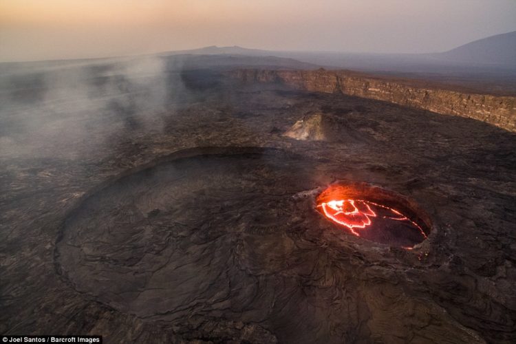 The entire volcano begins to bursting with lava into the air. The Danakil Desert is officially the hottest inhabited place on earth. 