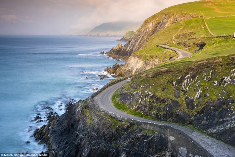 The winding roads near Coumeenoole Bay in Slea Head in County Kerry have steep cliffs with sheer falls to the crashing waves