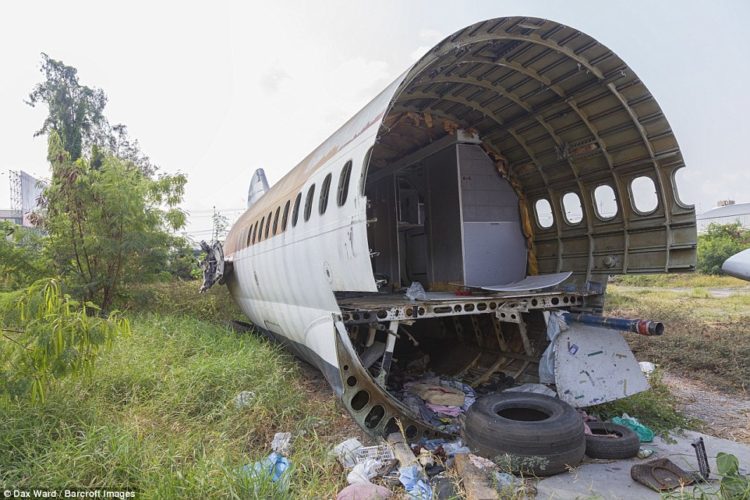 The interiors of the plane have been mostly stripped away to reveal the bare bones of the giant crafts, but the carpeting, overhead bins and bathrooms remain intact