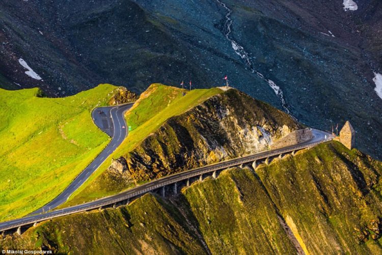 The road is peppered with mountain tops, glacier lakes, wild flowers and remote roadside huts