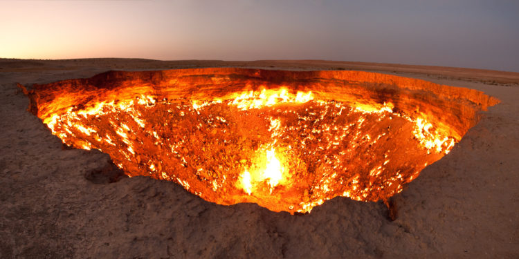 This natural gas crater in Turkmenistan is known as The Door to Hell and has been burning continually since geologists set it on fire in 1971 to prevent the spread of methane gas