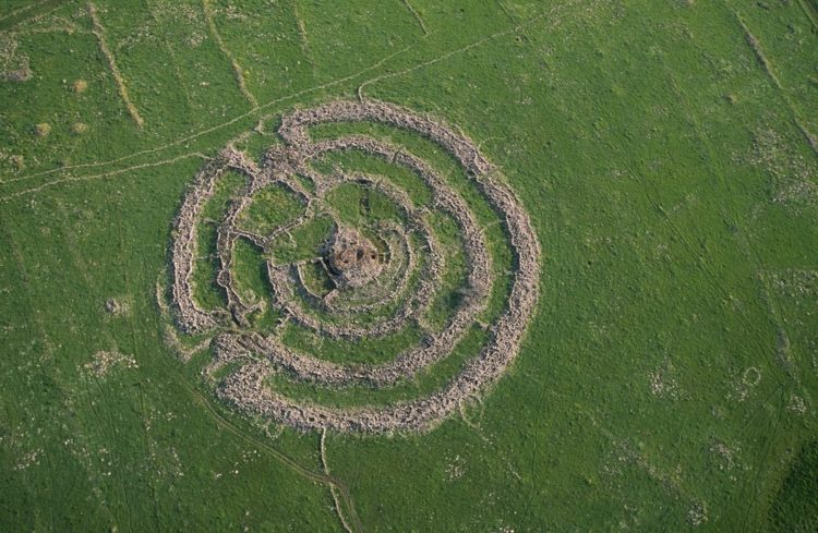 the ancient megalith monument, comprising of concentric stone circles and a tumulus at the center. 