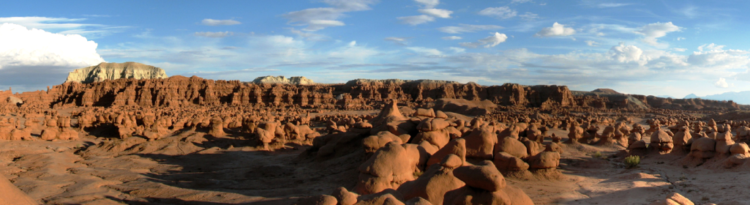 The Chaffin and his friends were awed by what they saw five buttes and a valley of strange, goblin-shaped rock formations fenced by a wall of eroded cliffs. 