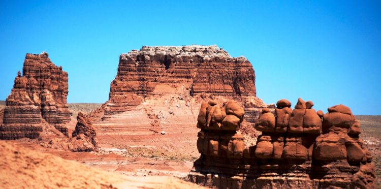 The landscape, covered with sandstone goblins and formations, is often compared to Mars. Explore the geology, and camp among the nooks and gnomes.