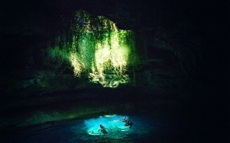 The water in the underground river is a constant 22 °C degree, cold weather water vapor rising from the surface of the river forms a noticeable plume above the entrance to the cave. It is suggested a chimney from Hell to early settlers. 