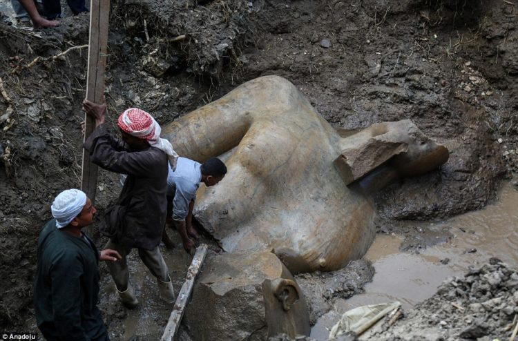 The quartzite colossus of Ramses II after they were discovered at the ancient Heliopolis archaeological site