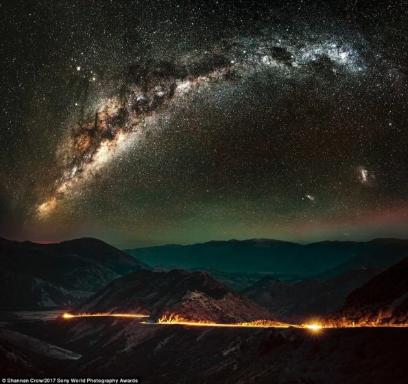 The scattered stars of the Milky Way light up the sky above the main highway through the southern Alps in the South Island of New Zealand