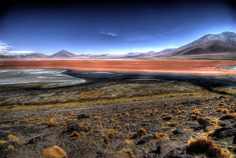 Southwest Bolivia contains some of the world's wildest and most remarkable landscapes, including the Laguna Verde, backed by the dormant 19,555ft Licancábur volcano. 