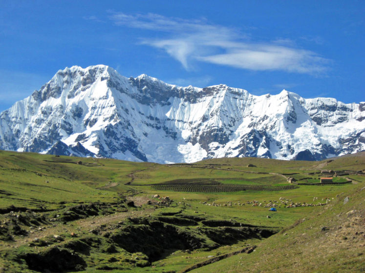 Ausangate Mountain has an elevation of 6,384 meters, situated around 100 kilometers southeast of Cusco in the Cusco Region, Ocongate District.
