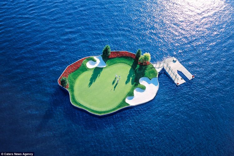 The famous 14th hole, pictured, is 'one of the most unique and recognisable golf holes in the world' according to the resort