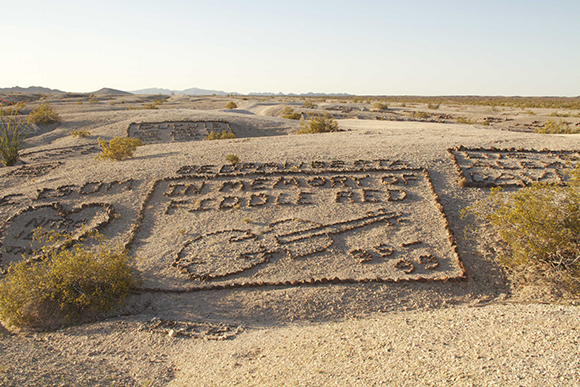 Graffiti Mesa - A Valley of Names - During World War II, soldiers training in the desert north of Yuma, Arizona, started decorating a site they called “Graffiti Mesa,” using rocks to write out their names in the white sand. 