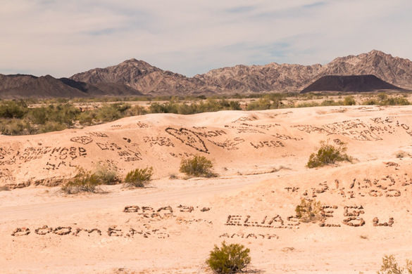 They expressed their feelings by placing stones on a piece of deserted land. They hoped that, even if they may never return home, their loved ones would get to see their message.