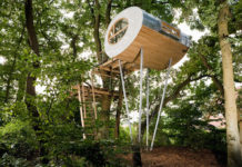 Amazing Treehouse Built Around Two Large Oak Trees This amazing Tree House is built around two large oak trees djuren was made as a relaxed retreat for a family on a wooded property in Germany