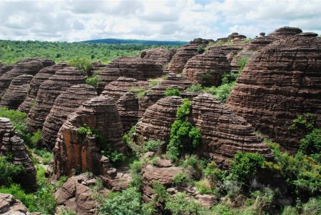 The Natural Domes of Fabedougou very closely resemble to the famous sandstone towers of Bungle Bungle Range in Australia, hardly half a million years old. 
