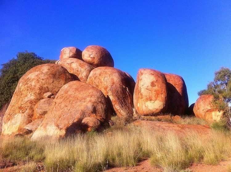 Devil’s Marbles Karlu Karlu, collection of giant granite boulders strewn across shallow valley recognized by local Warumungu Aboriginals. It spread out and settled into a solid layer within the Earth's crust. Thus, after some time, tectonic forces caused folding of the Earth's crust in the area.