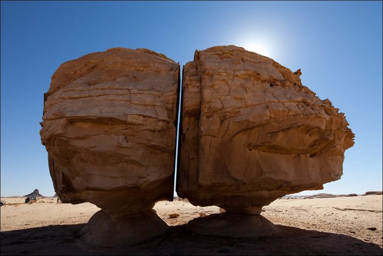 The Al Naslaa Rock formation may puzzle you to see two standing stones and flat faces are completely in natural shape. 