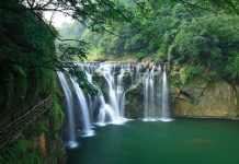 Shifen Waterfall – The Little Niagara of Taiwan This is an electric place full of excitement? Walking on the two pedestrian suspension bridges make its real beauty, as turquoise river passing luscious green mountains.