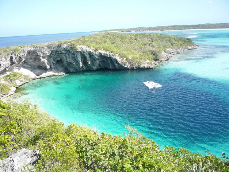 Dean's Blue Hole is the world's deepest known blue hole with seawater. It plunges 202 meters (663 ft) in a bay west of Clarence Town on Long Island, Bahamas.