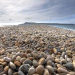 Shingle Beach is unique as referred to pebble beach or rocky beach. This beach is armoured with beautiful pebbles and medium sized cobbles.