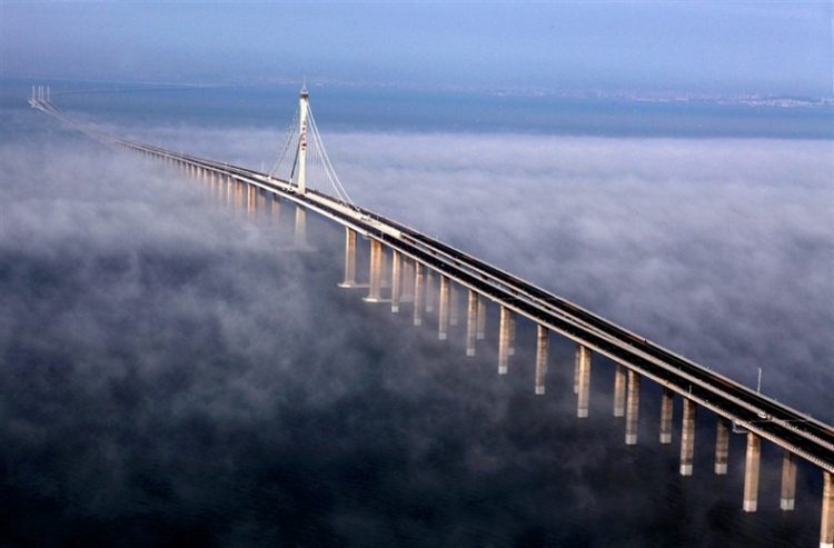 The T-shaped Jiaozhou Bay Bridge is a 26.7 km long roadway bridge in eastern China's Shandong province.