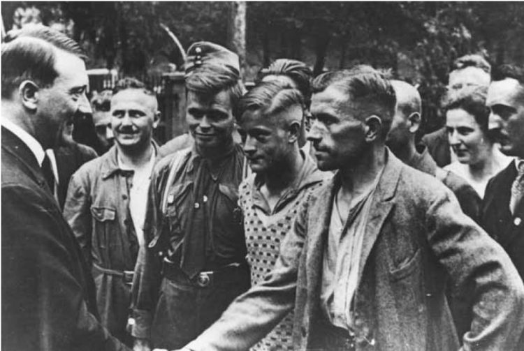 Hitler meets with German workers.