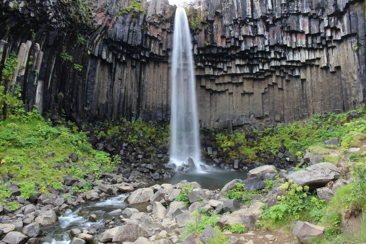 The lava flow cooled at a languid pace with frosty air, turned to a beautiful black color over its creation.