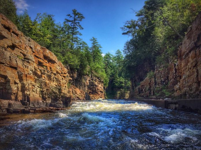 Ausable River Trail runs the length of Ausable Chasm from end to end along its north side. 