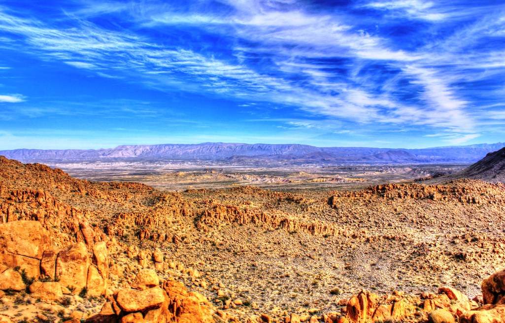 Big Bend NP Texas is a southern arid land consisting of 801,163 acres and spans 118 miles of the Rio Grande River in southwest Texas.