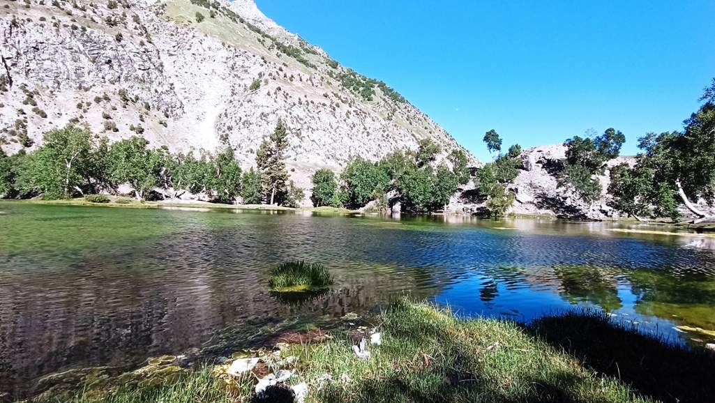 Satrangi Lake is fed by the underground spring of surrounding peaks.