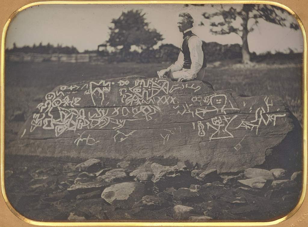 Daguerrotype (mirror-reversed) image of Seth Eastman on Dighton Rock (c. 1853)