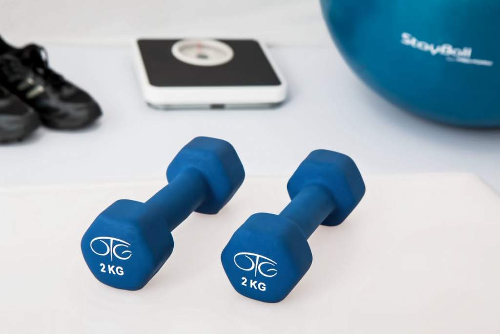 What's Better, Working Out at Home or at the Gym? It is possible to perform a wide variety of exercises with a gym ball and a set of dumbbells. 