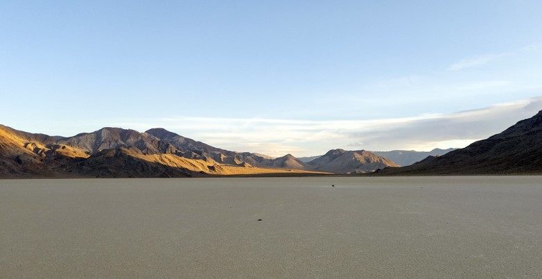 A scenic dry lake feature known as The Racetrack Playa features sailing stones that leave linear imprints of a racetrack on the ground.