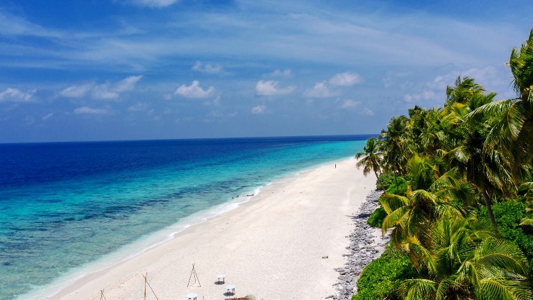 In the Maldives, are you looking for a serene and peaceful beach to relax on?