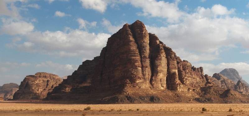 Its original Arabic name is Jebel al-Mazmar, which means "The Mountain of the Plague."