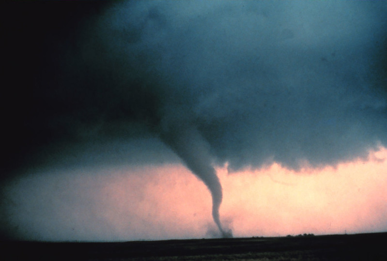 What is a tornado A tornado is a violent, whirling storm that occurs with the greatest frequency, often accompanied by thunder and lightning.