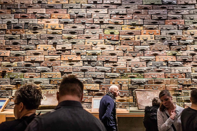 A Polish wall of suitcases belonging to people interned in concentration camps during World War II.